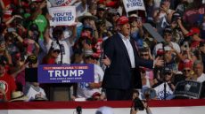 BUTLER, PENNSYLVANIA - JULY 13: Republican presidential candidate, former U.S. President Donald Trump speaks at a rally at Butler Farm Show Inc. on July 13, 2024 in Butler, Pennsylvania. Shortly after, shots rang out and Trump slumped before being whisked away by Secret Service with injuries visible to the side of his head. Butler County district attorney Richard Goldinger said the shooter and one audience member are dead and another was injured. Jeff Swensen/Getty Images/AFP (Photo by JEFF SWENSEN / GETTY IMAGES NORTH AMERICA / Getty Images via AFP)