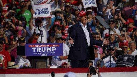BUTLER, PENNSYLVANIA - JULY 13: Republican presidential candidate, former U.S. President Donald Trump speaks at a rally at Butler Farm Show Inc. on July 13, 2024 in Butler, Pennsylvania. Shortly after, shots rang out and Trump slumped before being whisked away by Secret Service with injuries visible to the side of his head. Butler County district attorney Richard Goldinger said the shooter and one audience member are dead and another was injured. Jeff Swensen/Getty Images/AFP (Photo by JEFF SWENSEN / GETTY IMAGES NORTH AMERICA / Getty Images via AFP)